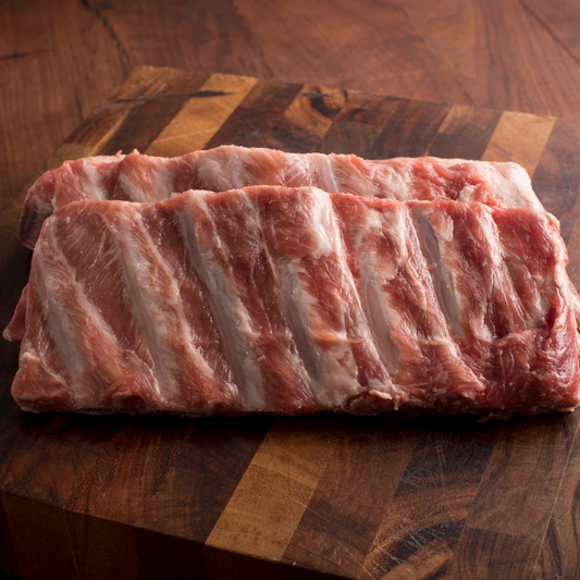 Grass roots Farmers' Co-op Pork Spare Ribs: St. Louis style pork spare ribs are meatier and have more fat marbling and flavor than baby backs. Their richness pairs beautifully with a sweet or tangy barbecue sauce, or  prepared simply with a seasoned dry rub. The classic cooking method for St. Louis-style spare ribs is to smoke or grill them low and slow, you can also slow cook them in the oven to achieve that sought-after fall-off-the-bone tenderness. -Weight app. 2.5–3 lbs.